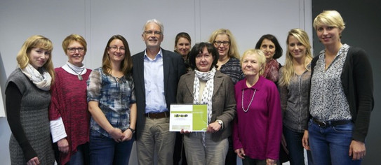 Gruppenfoto mit 11 Personen